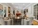 Comfortable sitting area with a pool table, chairs, and hardwood floors, perfect for entertaining guests at 9723 Sedgefield Dr, Waxhaw, NC 28173