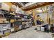 Unfinished basement storage with shelving for organization and storing belongings at 9723 Sedgefield Dr, Waxhaw, NC 28173