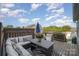 Cozy outdoor deck with comfortable seating, perfect for relaxing and enjoying the view on a sunny day at 1001 Hatton Ter, Fort Mill, SC 29707