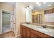 Bathroom with double vanity, shower, and soaking tub at 1001 Hatton Ter, Fort Mill, SC 29707