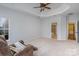 Bedroom featuring a trey ceiling, neutral walls and carpeting, and plenty of natural light at 1001 Hatton Ter, Fort Mill, SC 29707