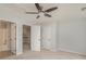 Bedroom featuring a ceiling fan and two entry doors at 1001 Hatton Ter, Fort Mill, SC 29707