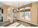 Sunlit dining room with hardwood floors, a chandelier, and built-in window seat at 1001 Hatton Ter, Fort Mill, SC 29707