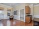 Dining Room featuring hardwood floors, wainscoting, and natural light at 1001 Hatton Ter, Fort Mill, SC 29707