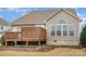 Rear exterior view showing deck, siding, and arched window at 1001 Hatton Ter, Fort Mill, SC 29707