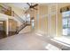 Spacious living room featuring high ceilings and a grand staircase at 1001 Hatton Ter, Fort Mill, SC 29707