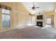 Two-story living room with a fireplace and high ceilings at 1001 Hatton Ter, Fort Mill, SC 29707