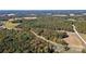 Aerial view of a wooded lot with road access at 1473 Polk Ford Rd, Stanfield, NC 28163