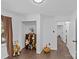 bedroom with giraffe toy, storage shelves, and a doorway to hallway at 1473 Polk Ford Rd, Stanfield, NC 28163