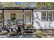 Quaint cottage exterior with porch and landscaping at 1473 Polk Ford Rd, Stanfield, NC 28163