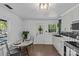 Modern kitchen with white cabinets and granite countertops at 1473 Polk Ford Rd, Stanfield, NC 28163