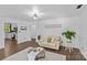 Spacious living room with hardwood floors and kitchen view at 1473 Polk Ford Rd, Stanfield, NC 28163