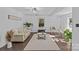 Bright living room with neutral decor and hardwood floors at 1473 Polk Ford Rd, Stanfield, NC 28163