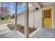 Inviting front door and porch with charming landscaping at 1509 Cripple Creek Rd, Kannapolis, NC 28081