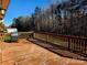 Spacious back deck with wooded view, perfect for grilling and outdoor entertaining at 2015 Pine Needle Ct, Gastonia, NC 28056