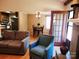 View of a cozy living room leading into a dining area, adjacent to the kitchen at 2015 Pine Needle Ct, Gastonia, NC 28056