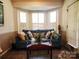 Cozy living room featuring a comfortable couch and natural light from windows at 2015 Pine Needle Ct, Gastonia, NC 28056