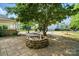 The backyard is complemented by a stone-paved firepit and a well-manicured lawn at 3007 Gambrill Falls Dr, Indian Trail, NC 28079