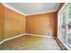 Bright room with a large window provides an ideal space for a home office or study at 3007 Gambrill Falls Dr, Indian Trail, NC 28079
