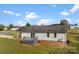 House exterior showcasing back deck and yard at 301 Walkers Ridge Dr, Shelby, NC 28152