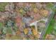 House nestled in wooded area with circular driveway at 3216 High Ridge Rd, Charlotte, NC 28270