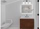 Contemporary bathroom with wooden vanity, modern toilet and updated fixtures at 3216 High Ridge Rd, Charlotte, NC 28270