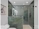 Spa-like bathroom with a large walk-in shower and green tile at 3216 High Ridge Rd, Charlotte, NC 28270