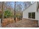 Home's deck and sliding glass doors leading to interior at 3216 High Ridge Rd, Charlotte, NC 28270