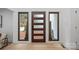 Modern entryway with wood door and sidelights at 3216 High Ridge Rd, Charlotte, NC 28270