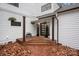 Inviting front entry with brick walkway, modern door, and hanging planters at 3216 High Ridge Rd, Charlotte, NC 28270