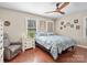 Comfortable bedroom with hardwood floors and ceiling fan at 3613 Ridge Rd, Indian Trail, NC 28079