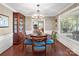 Bright dining room with hardwood floors and a charming chandelier at 3613 Ridge Rd, Indian Trail, NC 28079