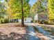 Gravel driveway, double garage, and shed at 3613 Ridge Rd, Indian Trail, NC 28079