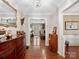 Elegant entryway with hardwood floors and antique furniture at 3613 Ridge Rd, Indian Trail, NC 28079