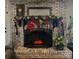 Brick fireplace with decorative mantel and stockings at 3613 Ridge Rd, Indian Trail, NC 28079