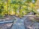 Well-manicured garden paths and sitting area at 3613 Ridge Rd, Indian Trail, NC 28079