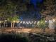 Charming backyard patio with string lights, perfect for evening gatherings at 3613 Ridge Rd, Indian Trail, NC 28079