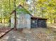 Metal storage shed with gated side access at 3613 Ridge Rd, Indian Trail, NC 28079