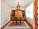 Breakfast room with natural light, hardwood floors, and built-in storage cabinets at 501 River Oaks Ln, Charlotte, NC 28226