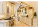 Bright kitchen with custom cabinets and granite countertops, perfect for cooking at 501 River Oaks Ln, Charlotte, NC 28226