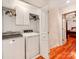 Efficient laundry room features modern washer and dryer, plus ample closet space for storage and organizing at 501 River Oaks Ln, Charlotte, NC 28226