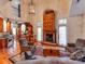This living room features hardwood floors, a large fireplace, and a well-lit atmosphere at 501 River Oaks Ln, Charlotte, NC 28226