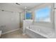 Bathroom with soaking tub and walk-in shower at 5011 Tatton Ln, Indian Land, SC 29707