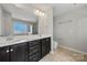 Double vanity bathroom with a shower and toilet at 5011 Tatton Ln, Indian Land, SC 29707