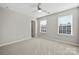 Well-lit bedroom featuring ceiling fan and neutral color palette at 5011 Tatton Ln, Indian Land, SC 29707