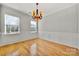 Formal dining room with hardwood floors and chandelier at 5011 Tatton Ln, Indian Land, SC 29707