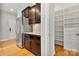 Kitchen with stainless steel refrigerator and pantry at 5011 Tatton Ln, Indian Land, SC 29707