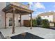 Private patio features a pergola and a stone tile floor at 5011 Tatton Ln, Indian Land, SC 29707