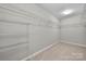 Spacious walk-in closet with wire shelving and hanging rods at 5011 Tatton Ln, Indian Land, SC 29707