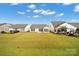 Well-maintained backyard featuring a spacious lawn and patio, perfect for outdoor entertaining at 20195 Dovekie Ln, Fort Mill, SC 29707